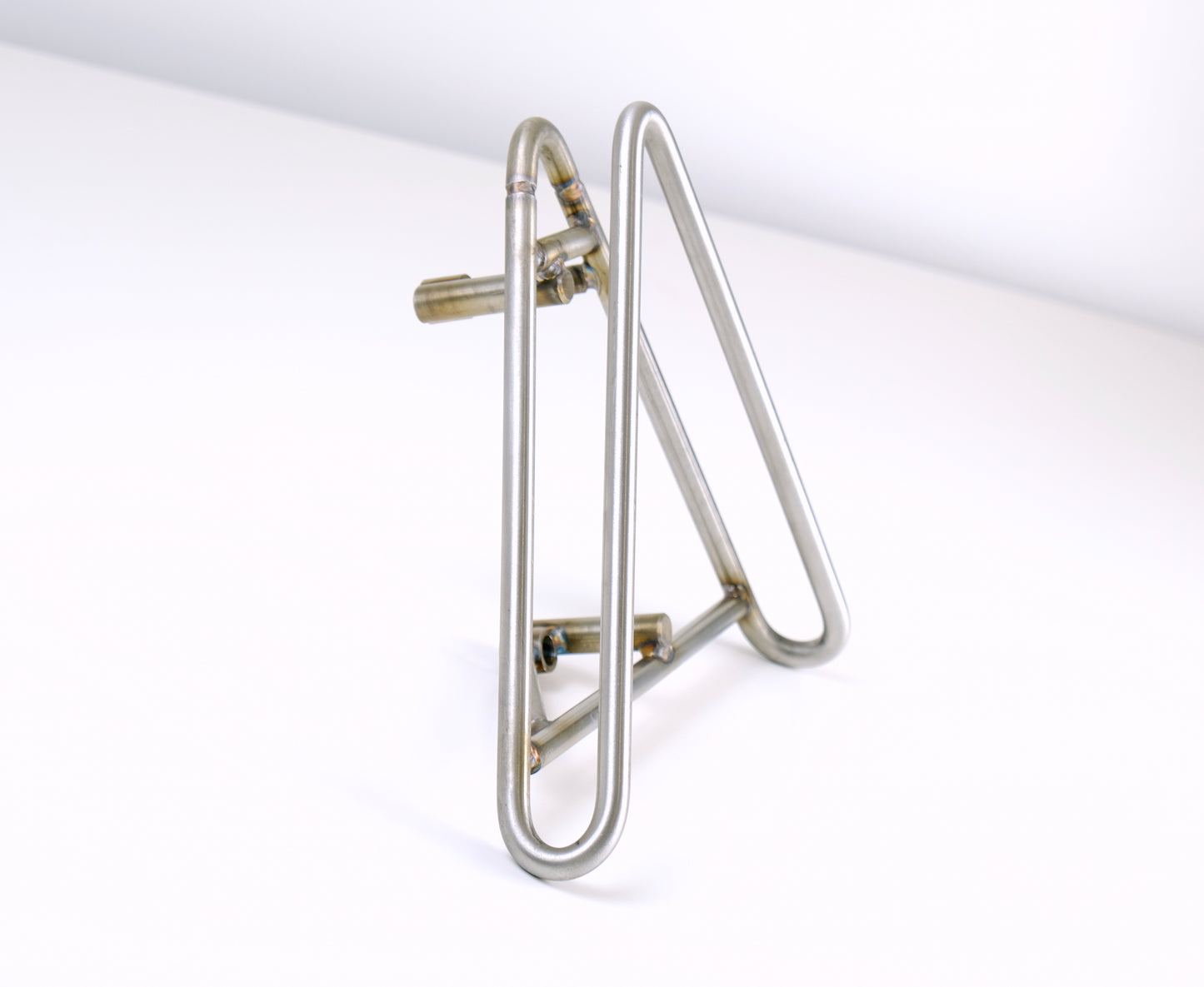 Edward Richie Motorcycle Skateboard rack in stainless steel side view unmounted