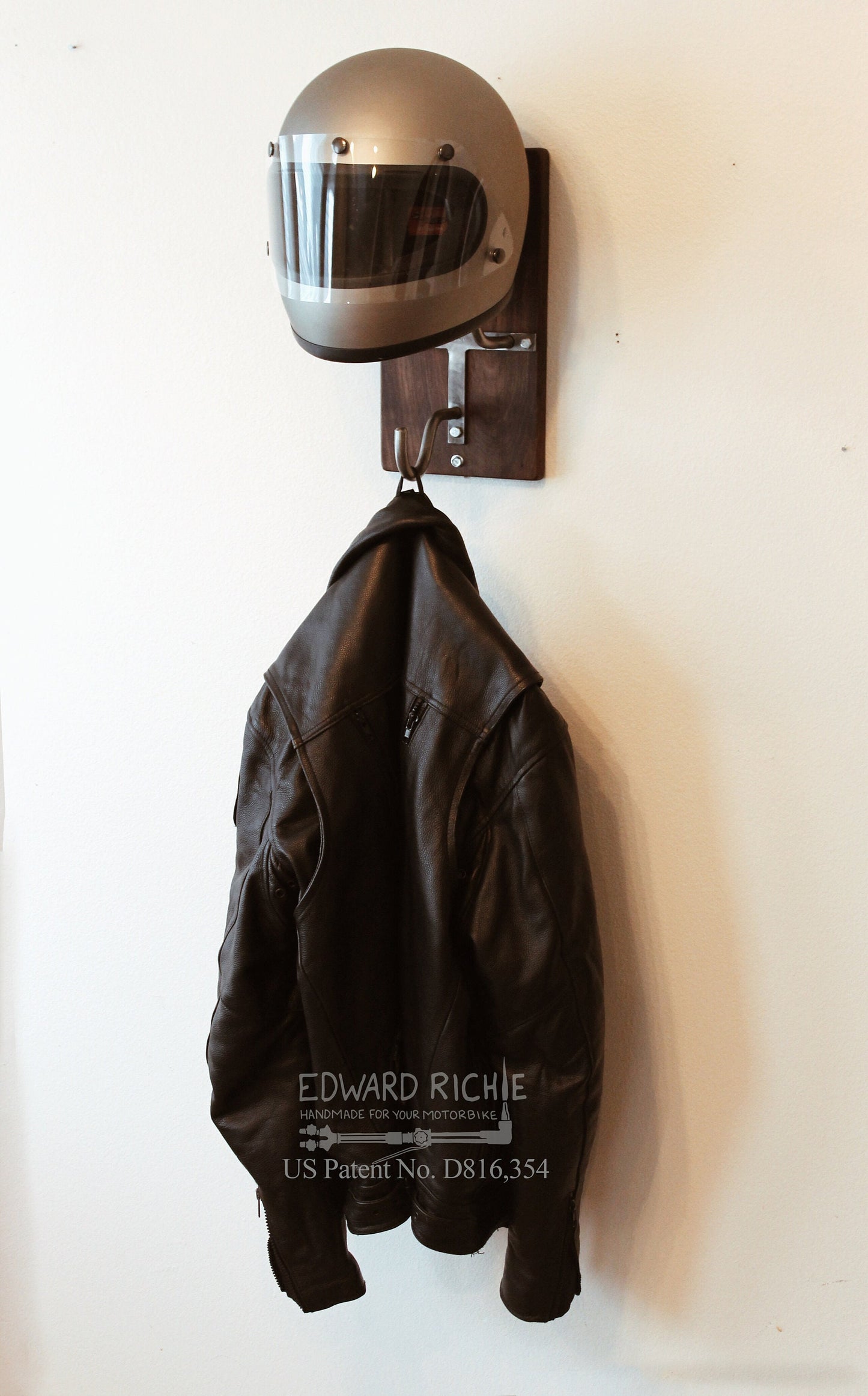 Edward Richie motorcycle helmet rack and jacket hook angled view with jacket and helmet