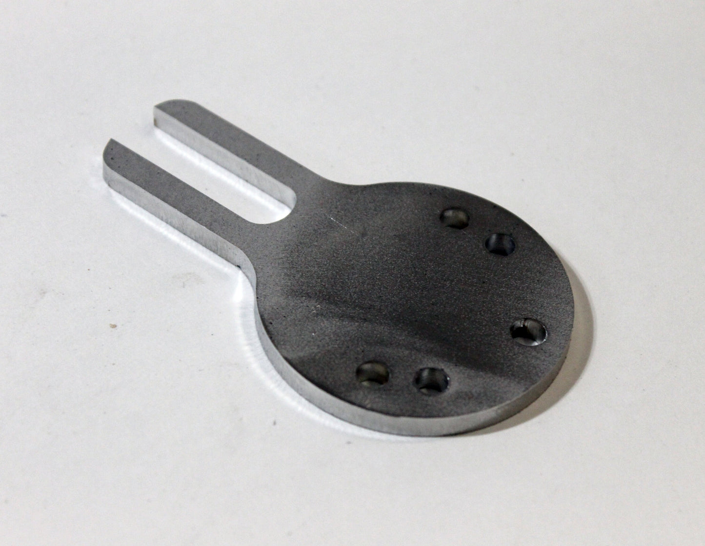 ratchet top shift plate stainless steel on white backing