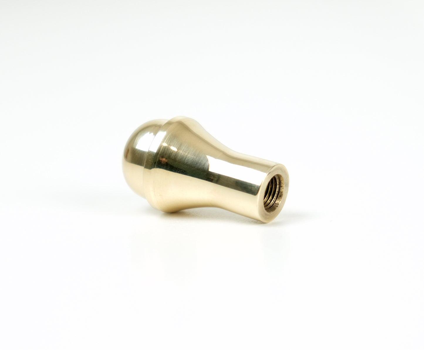 Edward Richie brass jokey shift knob on its side