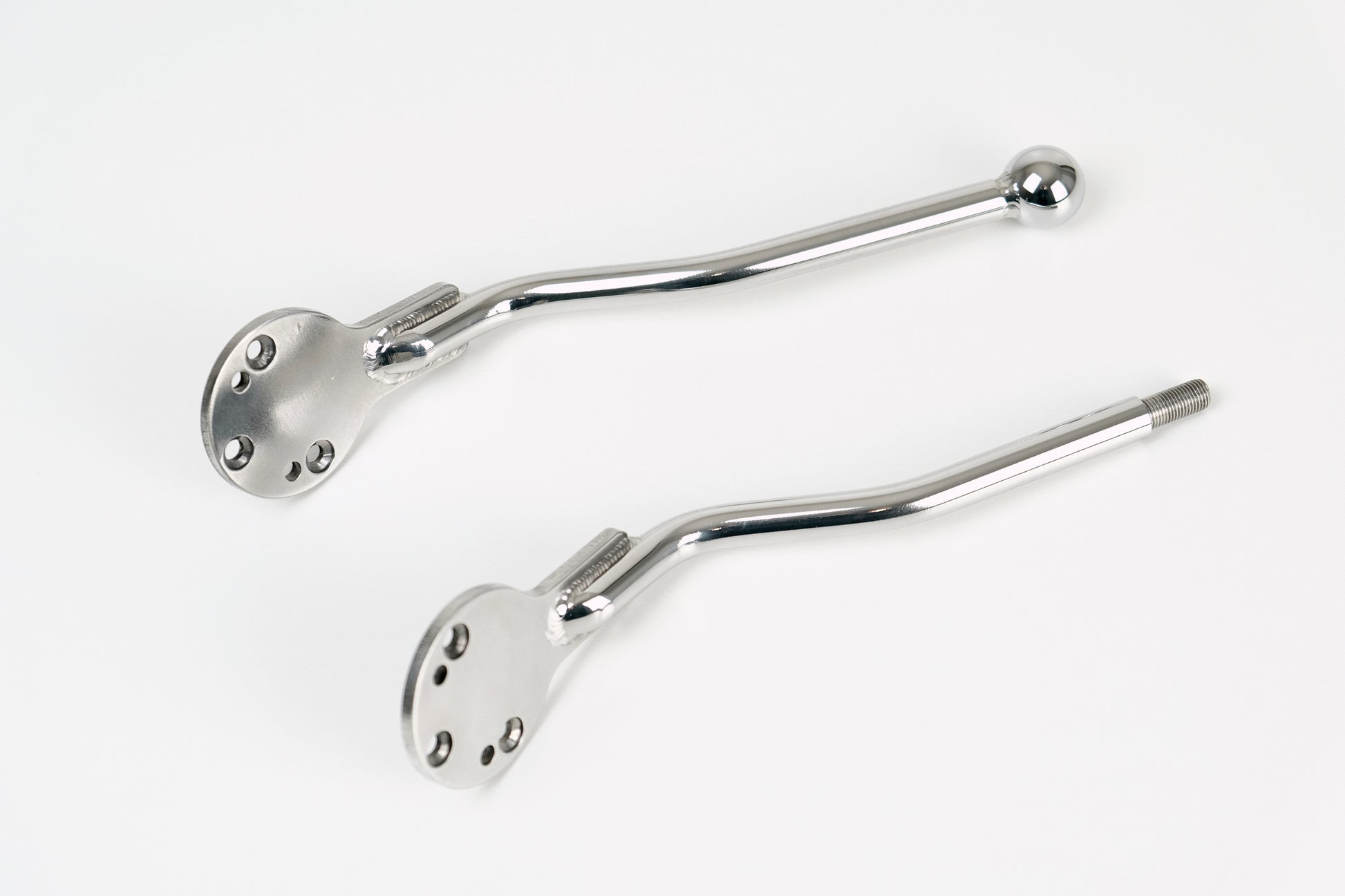 two Stainless edward richie jockey shifters one with a stud and one with a ball top